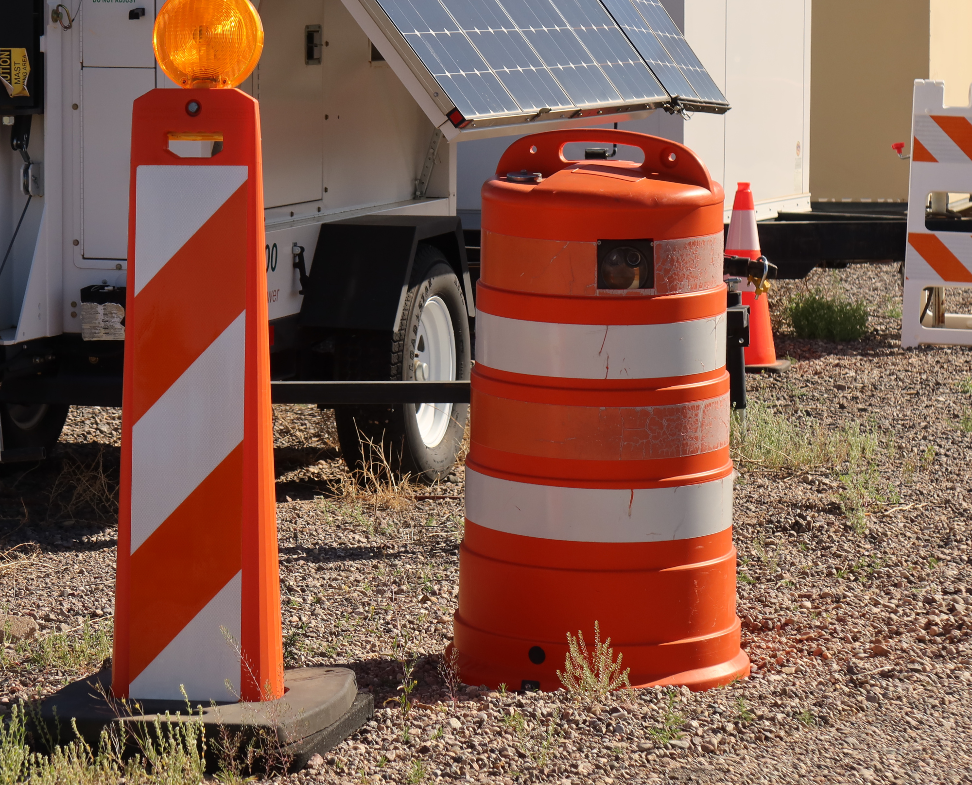 A camera hidden inside an orange traffic barrel